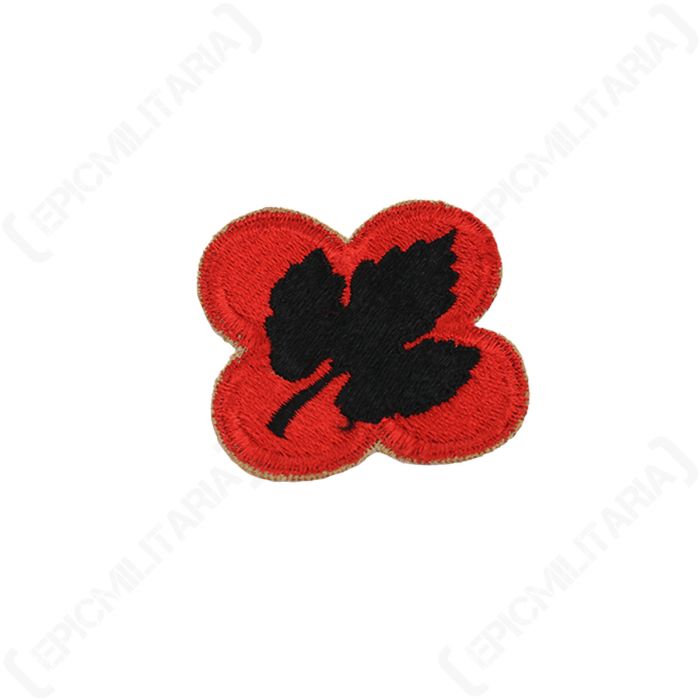 Close-up detail of the embroidered black grape leaf design on the US 43rd Infantry Division shoulder sleeve insignia