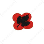 Close-up detail of the embroidered black grape leaf design on the US 43rd Infantry Division shoulder sleeve insignia