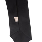 Detailed view of tag and rear seam stitching on black uniform tie