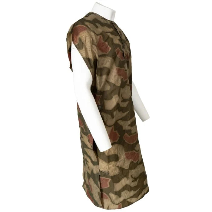 Side profile view of the West German Federal Border Guard Sumpftarn poncho on a mannequin.