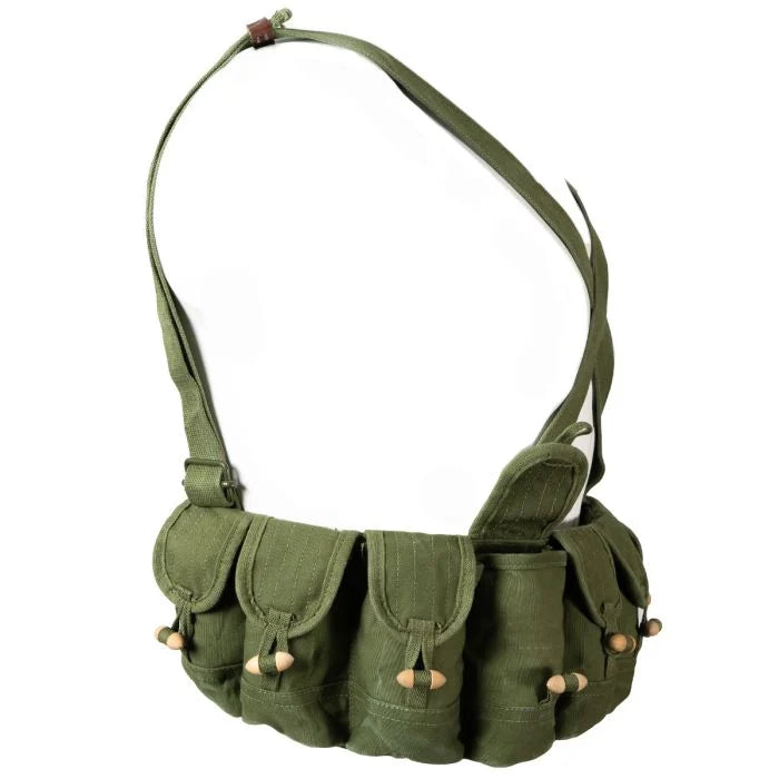 Side view of the olive SKS chest rig showing the pouch alignment and tie-back strap