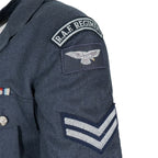 Detailed shot of RAF Regiment title flash and eagle insignia on dress jacket sleeve