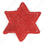 Reverse side of US Army 6th Infantry Division embroidered patch showing bobbin weave backing
