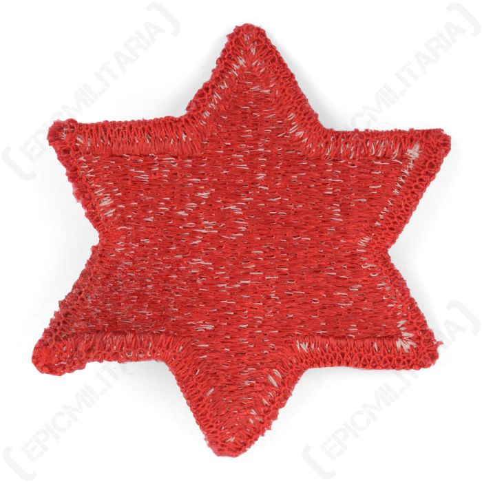 Reverse side of US Army 6th Infantry Division embroidered patch showing bobbin weave backing