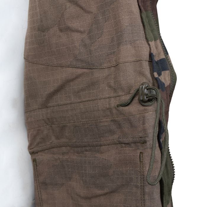 Close-up of the internal waist drawstring adjustment and fabric texture of the French T4 jacket