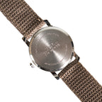 Stainless steel case back of the Eaglemoss Canadian pilot watch, stamped with 1940s Canadian Air Force branding and quartz movement details.