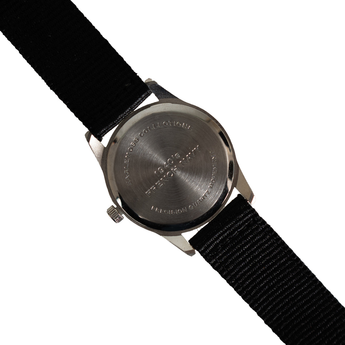 Close-up of the watch case back showing Eaglemoss collections branding and 1940s French Navy engraving.