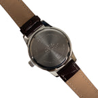 Reverse view of Eaglemoss French Naval Pilot watch showing the stainless steel case back with vintage-inspired engravings and Japanese quartz movement details.