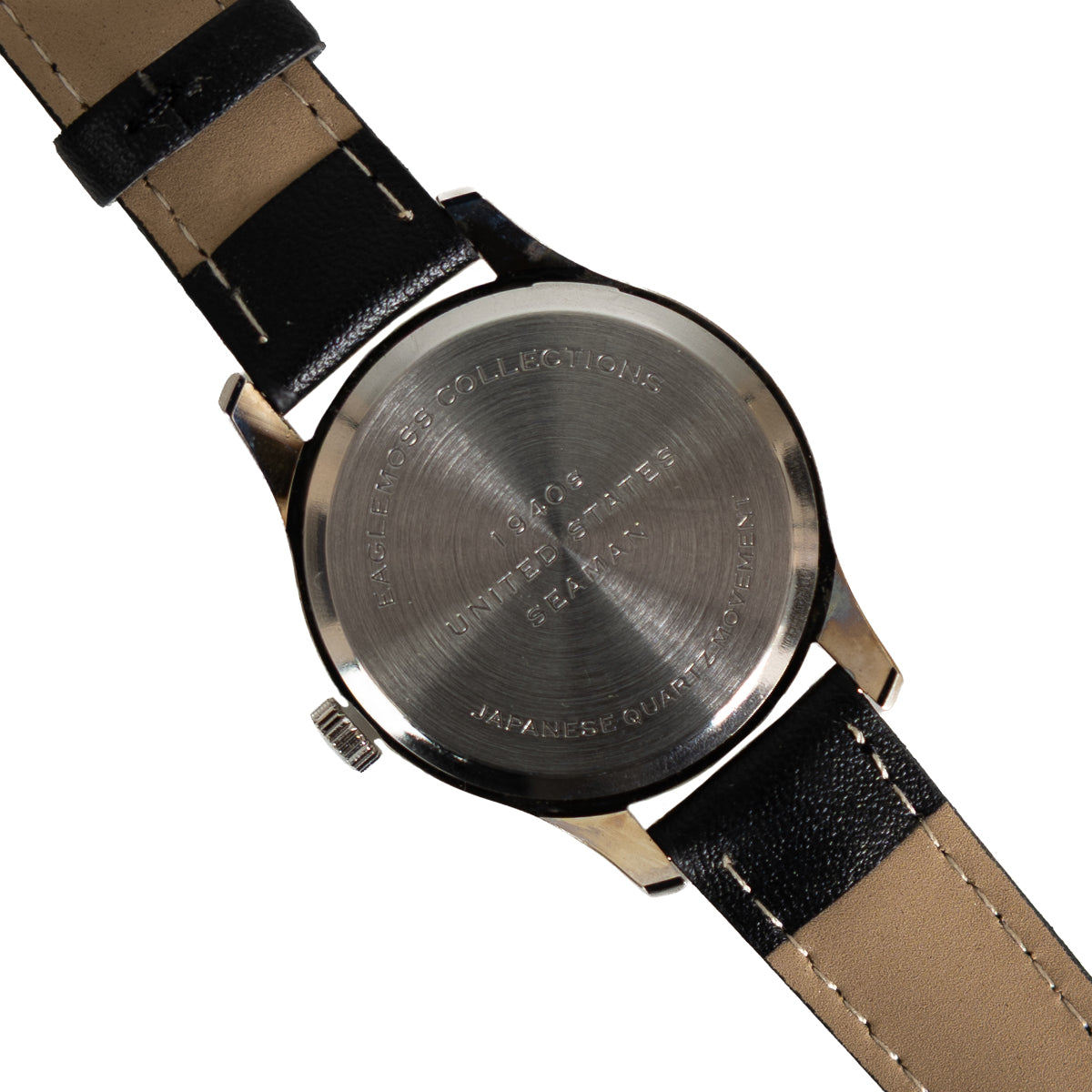 Stainless steel case back of the US Seaman's military watch with etched 1940s naval design markings.
