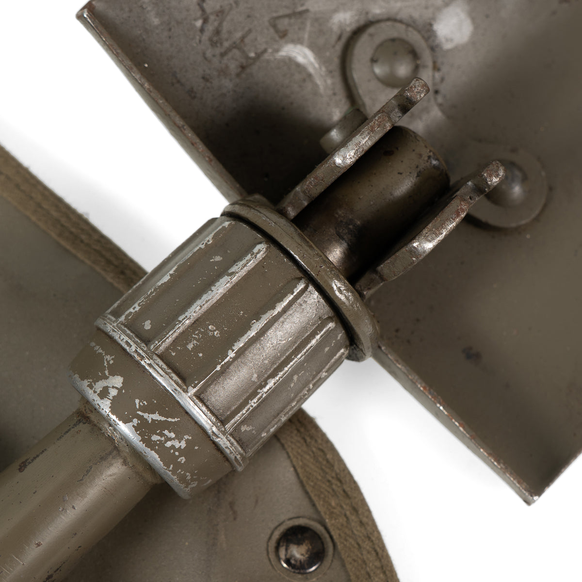 Detailed close-up of the threaded steel locking collar used to secure the shovel blade in straight or 90-degree positions.