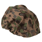 Three-quarter angle view of the Austrian military M75 helmet cover featuring the woodland pea-dot camo print.