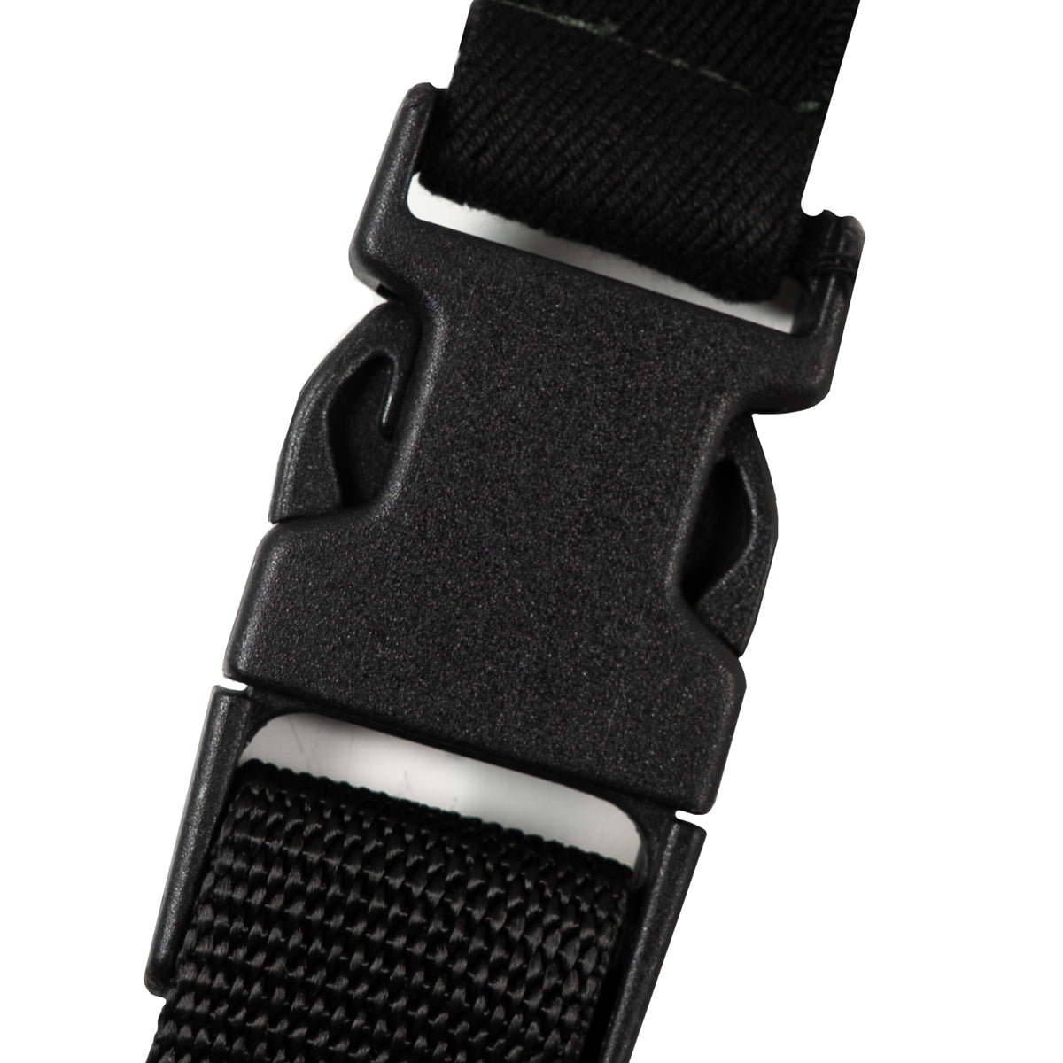 Close-up of durable black plastic buckle on adjustable suspension strap of military trousers.