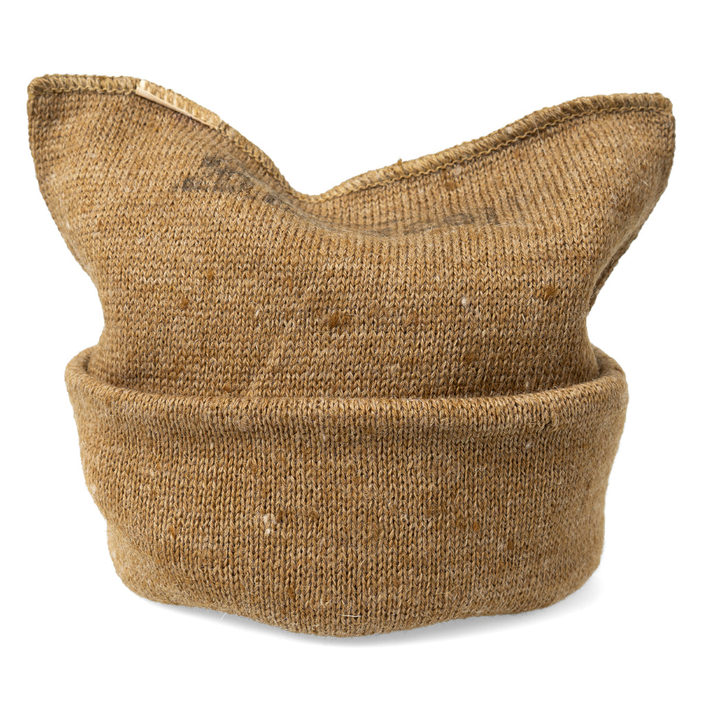 The British Army cap comforter shown folded with a clear view of the authentic vintage stamp detail.
