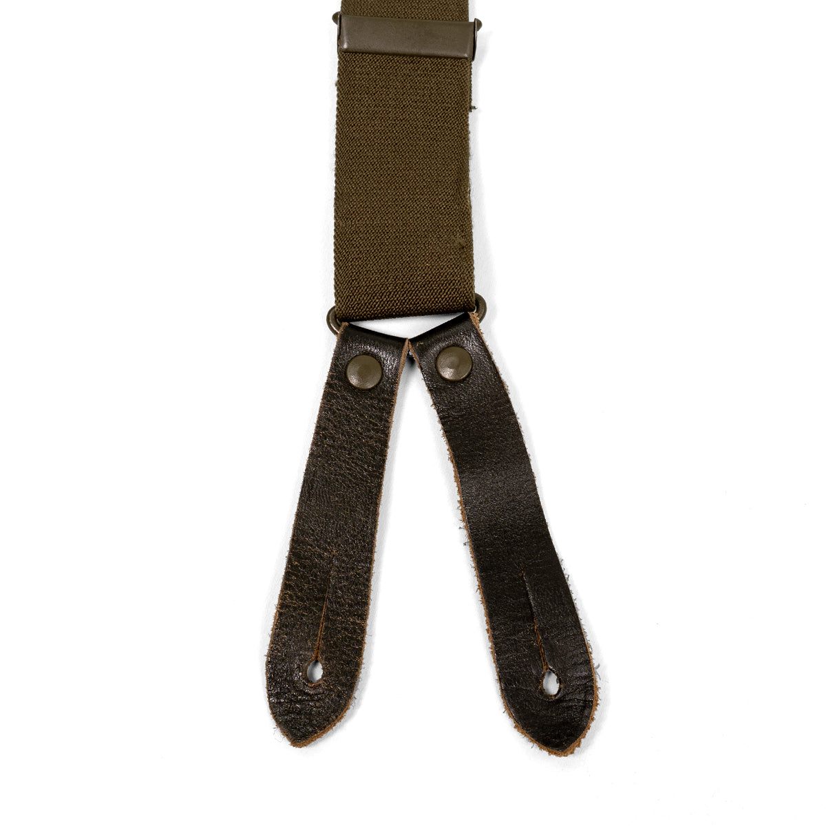 Detail of German Army brace attachment point with dark brown leather tabs, metal rivets, and buttonholes on olive green elastic webbing.