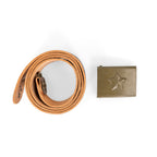 Czech Army surplus leather belt coiled next to its detached, olive-drab metal buckle with a prominent raised star.
