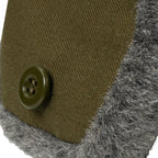 Close-up detail of the dark green button used to secure the foldable ear flaps on the authentic Czech Army Ushanka hat.