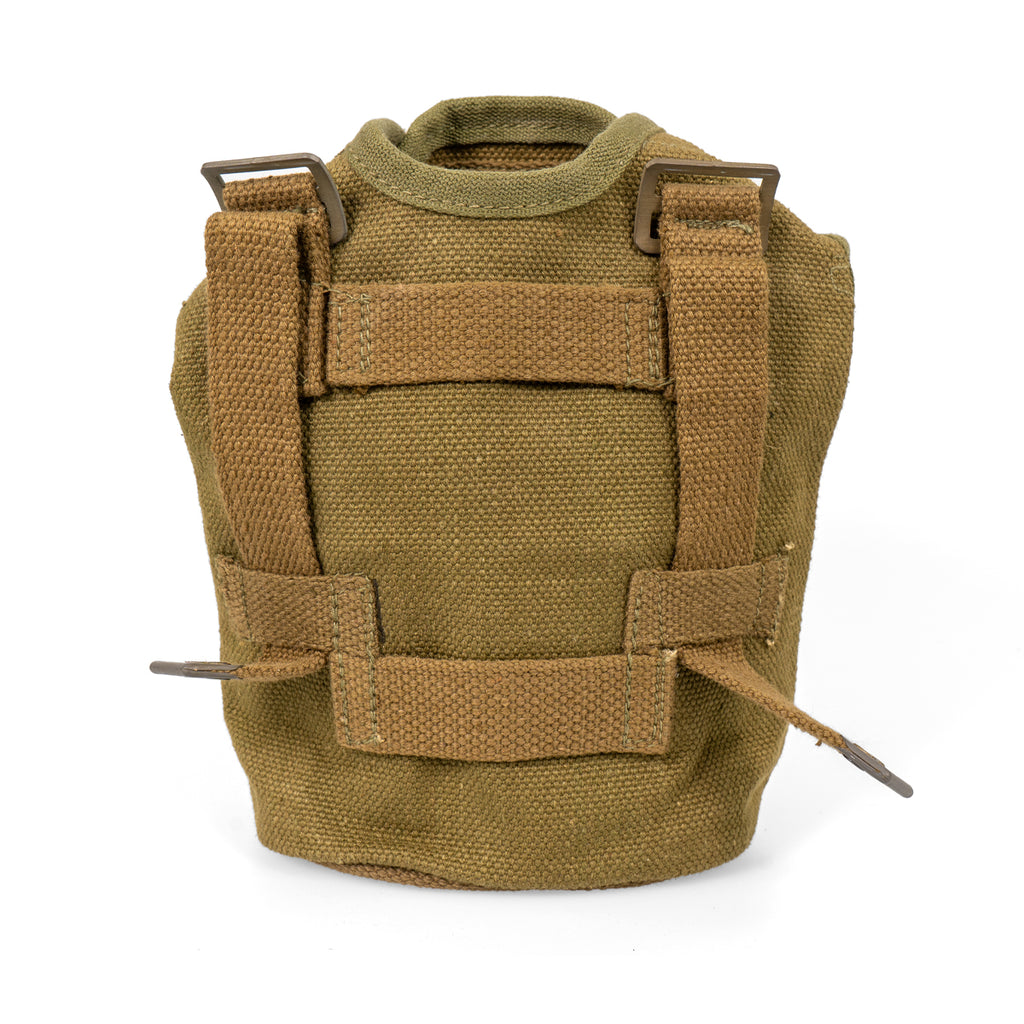 Rear view of original Danish M45 army canteen pouch showing heavy-duty cotton canvas construction, webbing straps, and brass slide buckles for belt mounting.