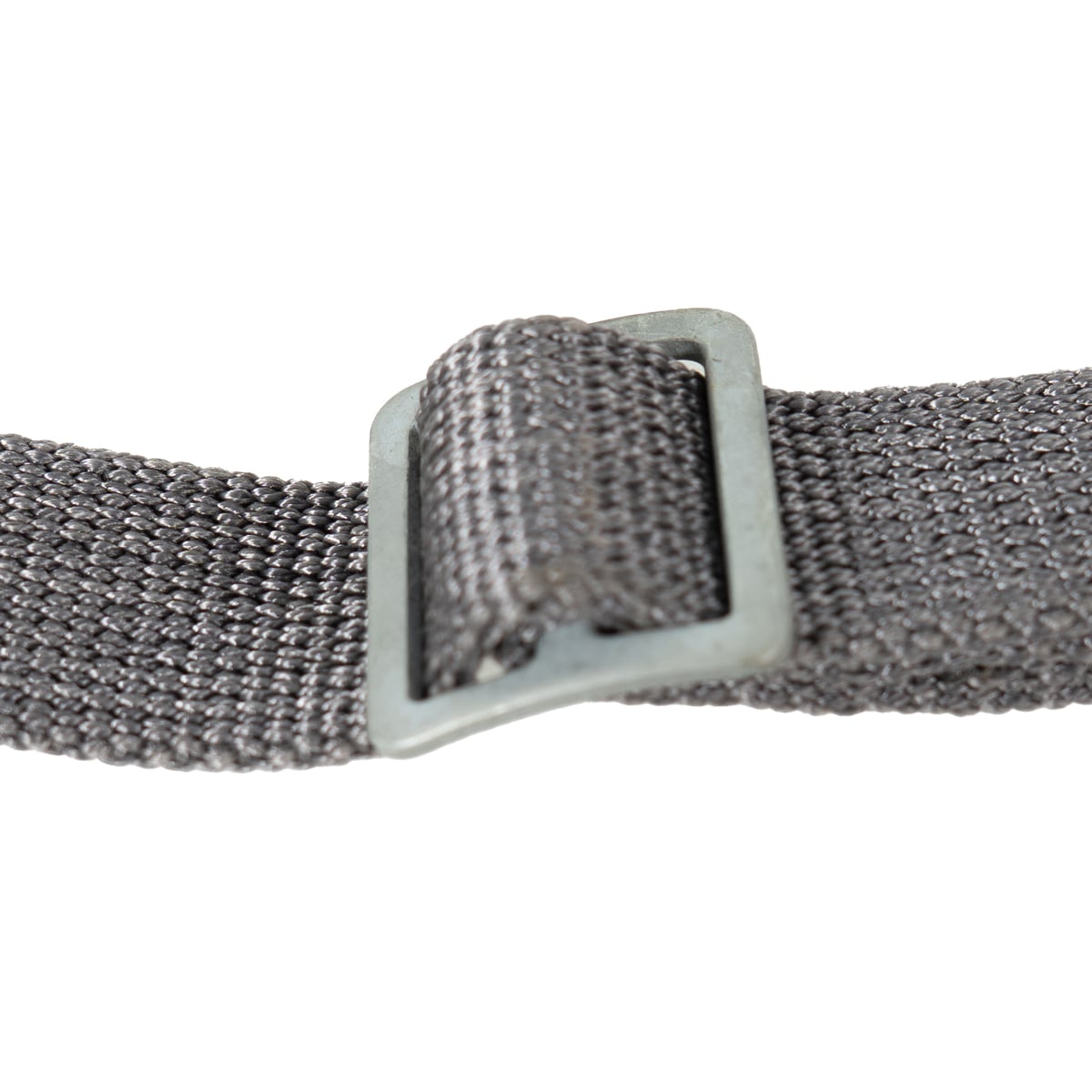 Steel slide buckle on an East German NVA rifle sling, designed for quick and reliable adjustment of the durable nylon webbing strap.