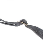 Detail of the adjustable metal sliding buckle on the heavy-duty Cold War era East German military utility sling.