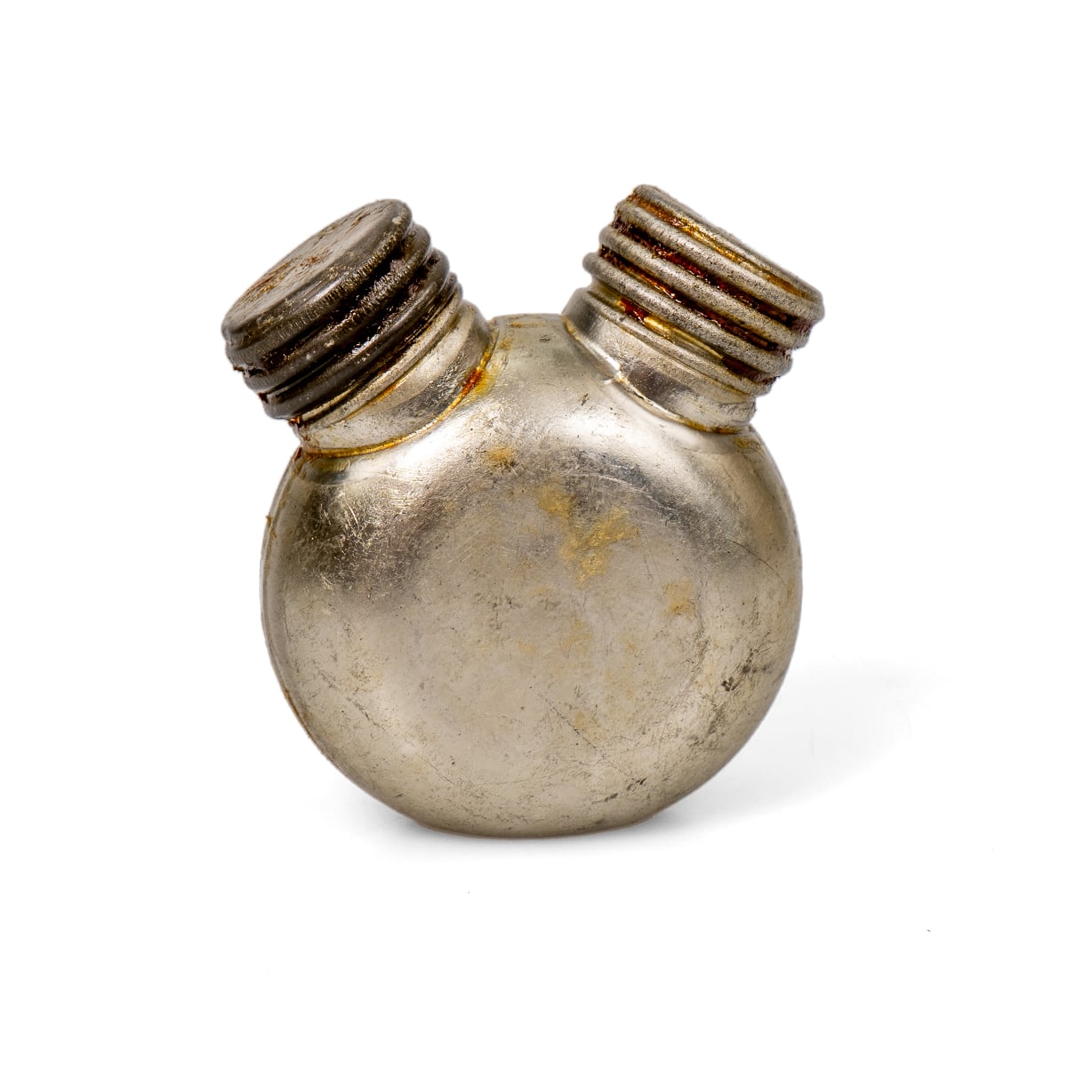 Close-up of a genuine Soviet Russian Army post-war metal oiler bottle with visible signs of age, wear, and authentic military patina.