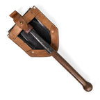 A US M1943 military foldable shovel secured inside the light brown leather JNA shovel cover, demonstrating the open-back design for easy equipment access.