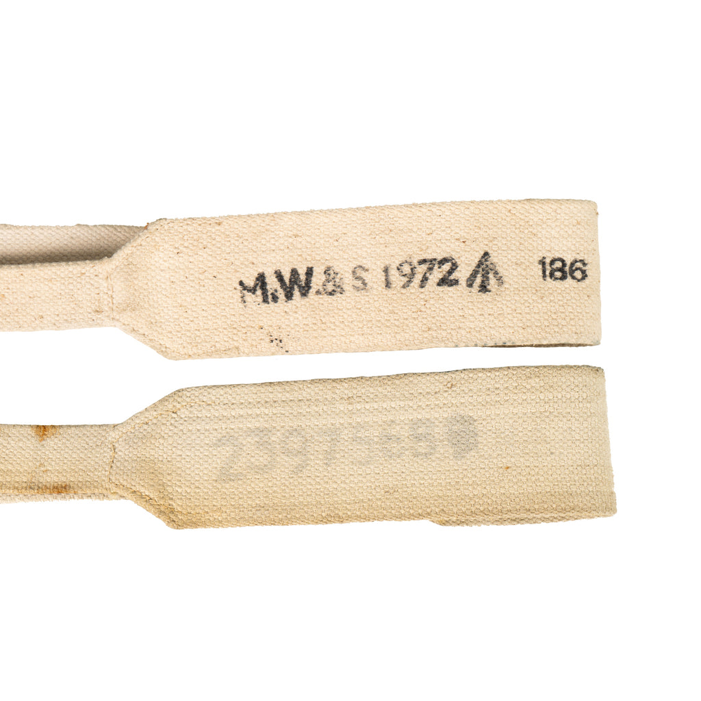 Detail view showing 1972 unit markings and broad arrow stamp on 37 Pattern canvas cross straps.