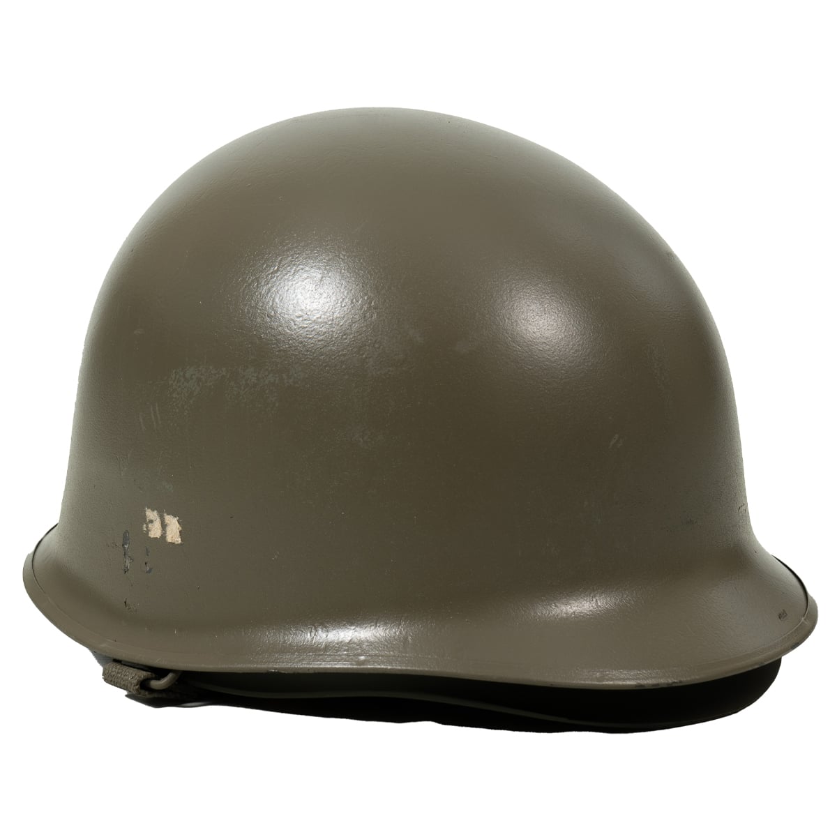 Three-quarter view of the US M1 style helmet in matte olive drab showing surface detail.