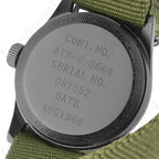 Detailed macro view of the stamped case back with MIL-W-3818B August 1966 markings