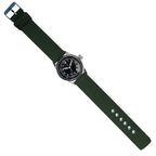 Full flat lay of US WW2 A-11 military service watch and green webbing wristband