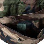 Detailed view of the buttoned flap on the dual-access rear lumbar poachers pocket