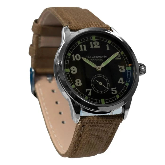 Angled side profile showing the gloss black dial, luminous hands, and steel bezel