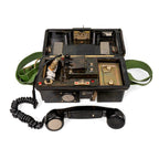 East German NVA Cold War field telephone open with handset and battery compartment