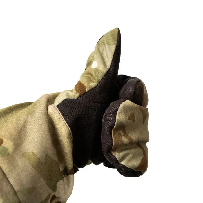 A person wearing the British Army MTP Goretex mitten making a thumbs-up gesture, demonstrating the hand movement and separate trigger finger.