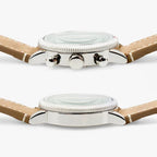 Side profile view highlighting the polished watch case, pushers, and knurled crown