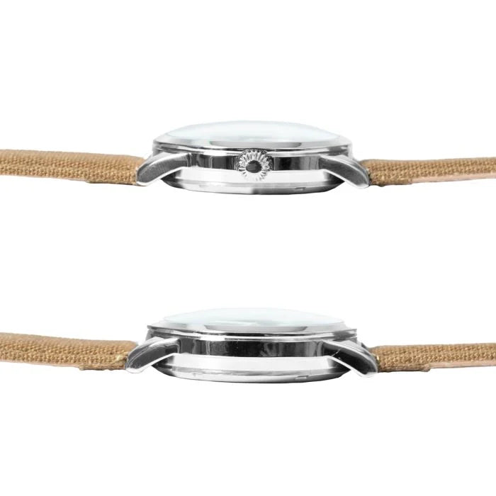 Dual side-profile views showing the domed crystal glass and fluted winding crown