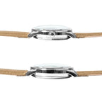 Dual side-profile views showing the domed crystal glass and fluted winding crown