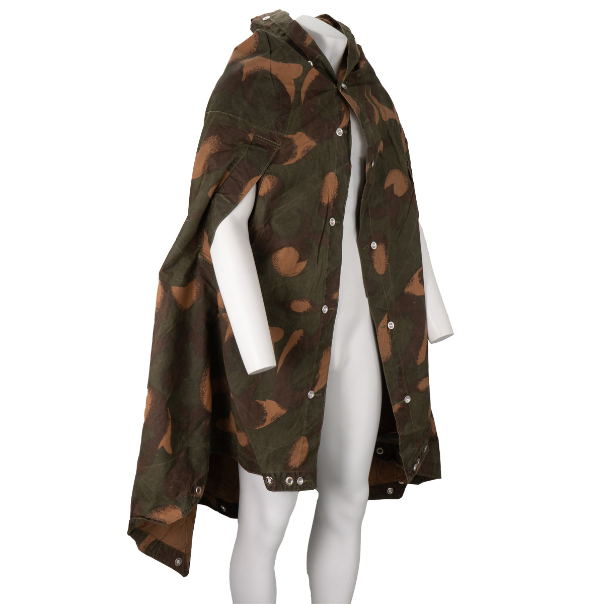 Side profile of the Hungarian military surplus Zeltbahn poncho displaying armholes and button fasteners.