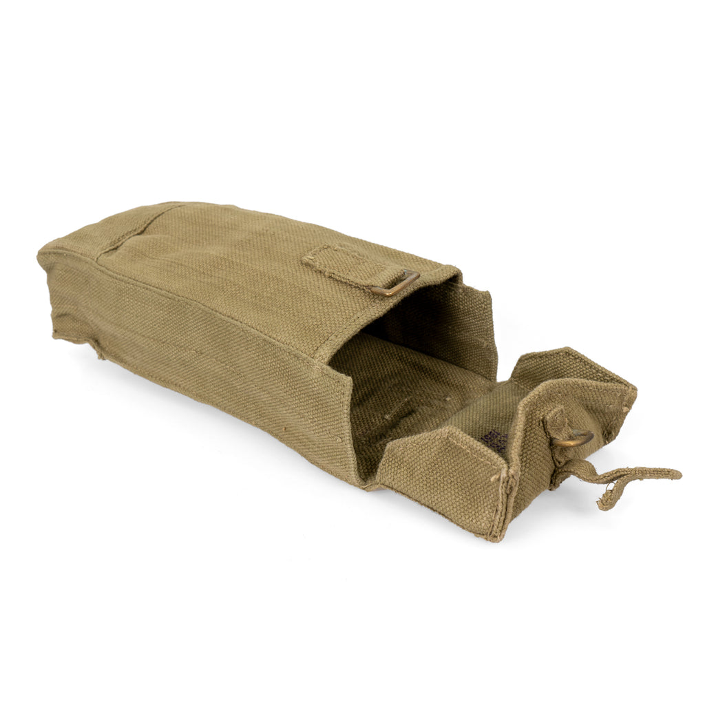 Open Belgian Army magazine pouch displaying the interior canvas compartment, brass hardware, and vintage military design.