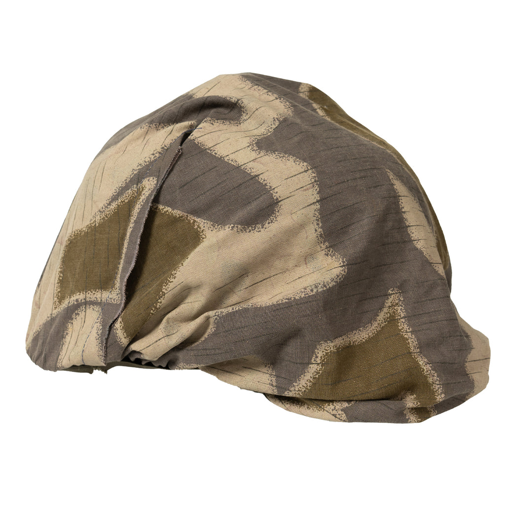 Side profile of the reversible M75 combat helmet cover showcasing the intricate Steintarnung stone terrain pattern.