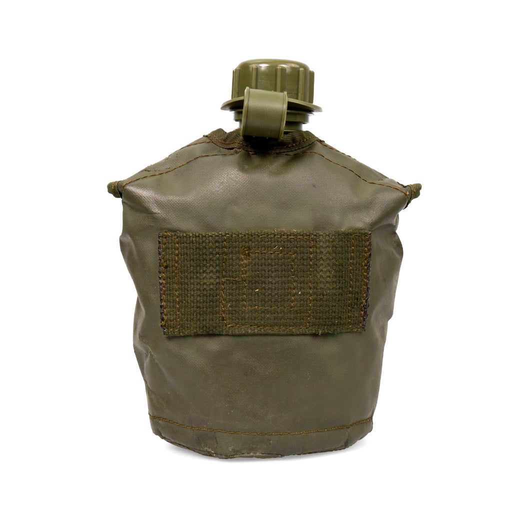 Rear view of the insulated canteen pouch showing the durable webbing loops for ALICE system integration on military gear.