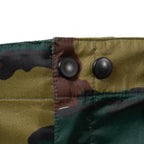 Detail view of front waistband buttons on genuine Belgian military Gore-Tex rain trousers.