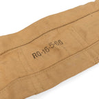 Detailed view of 1966 date stamp printed on the side of a vintage British Army Lee Enfield ammo bandolier.