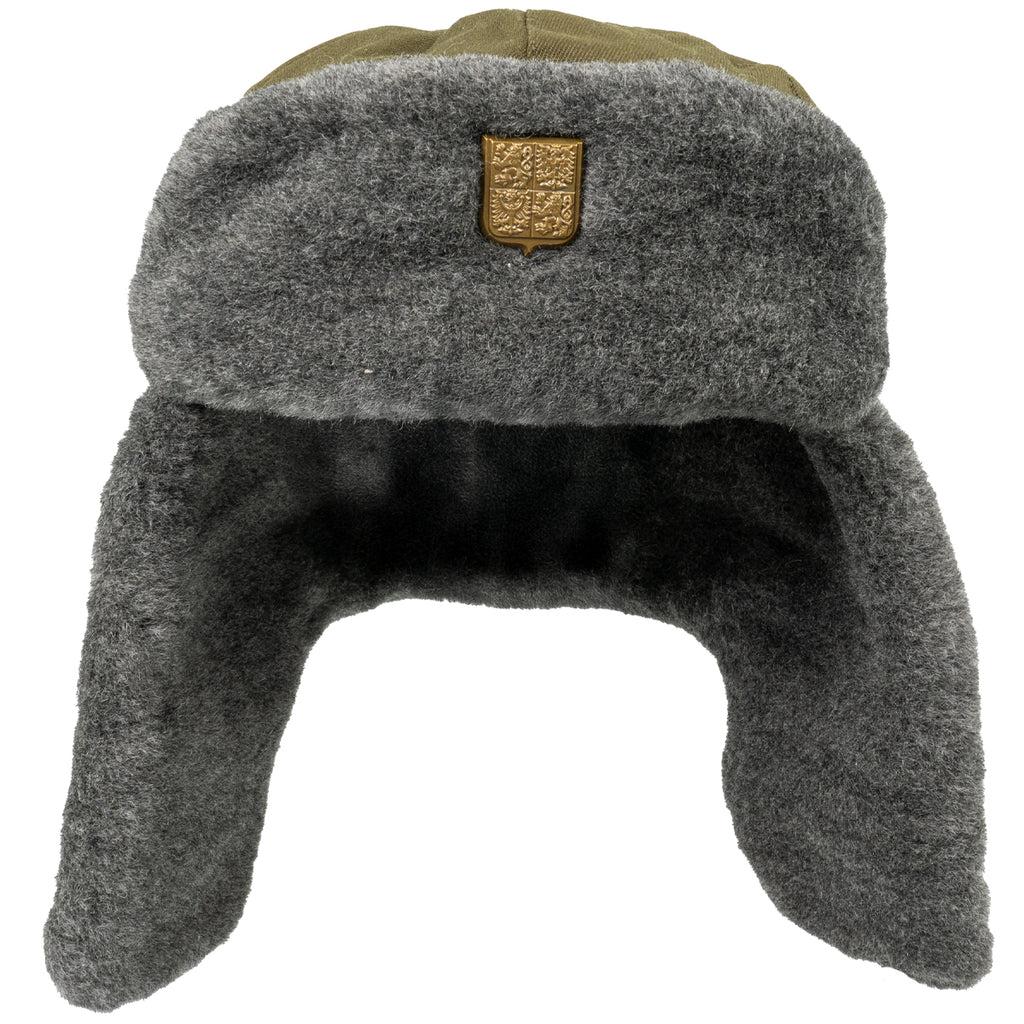 Front view of the Cold War era Czech Army Ushanka showcasing the thick grey faux fur lining and signature golden military badge.