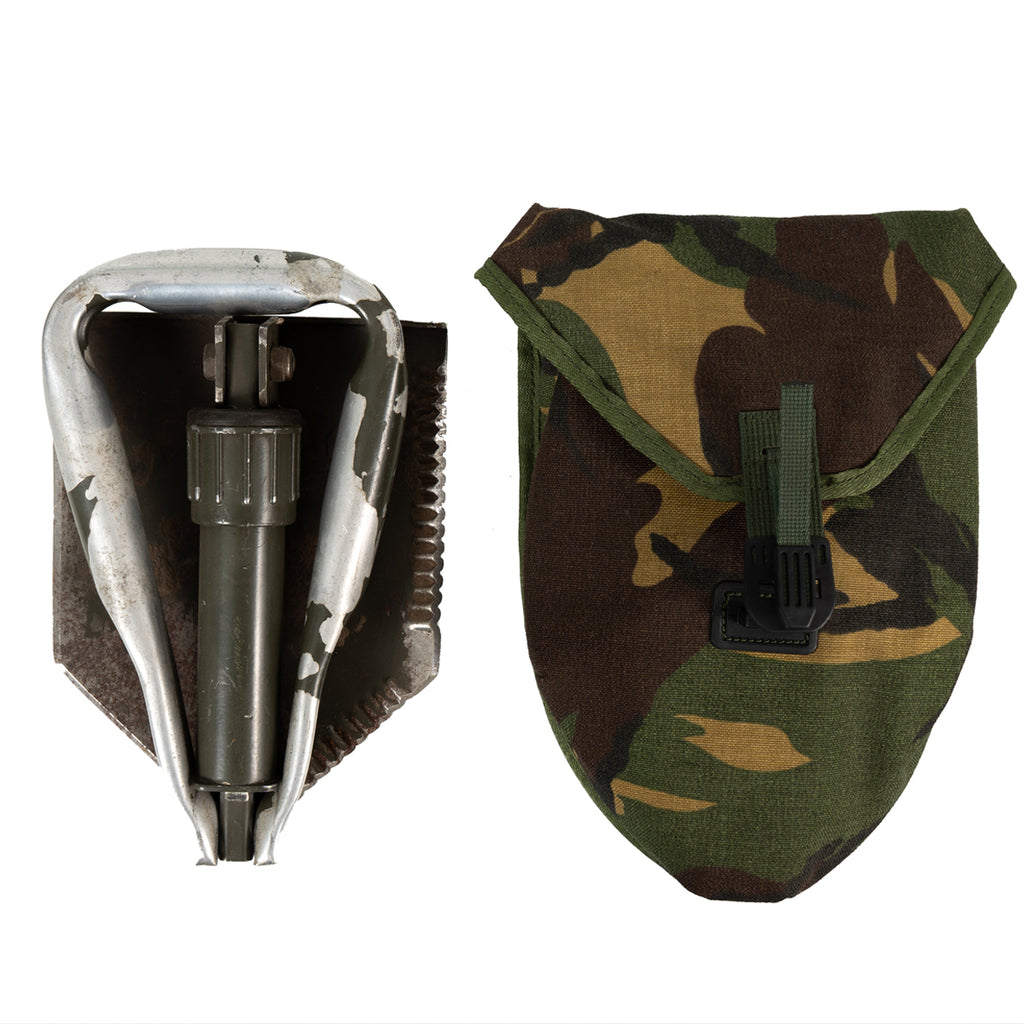 Dutch army folding shovel collapsed to its compact 24cm size next to its matching DPM camouflage carry case.