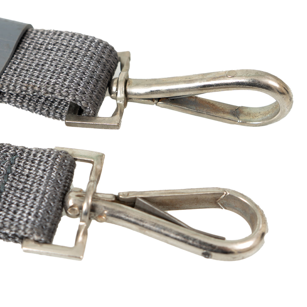 Detailed view of the dual spring-loaded steel hooks on an NVA rifle sling, highlighting the attachment points for MPi-K and MPi-AK-74 rifles.