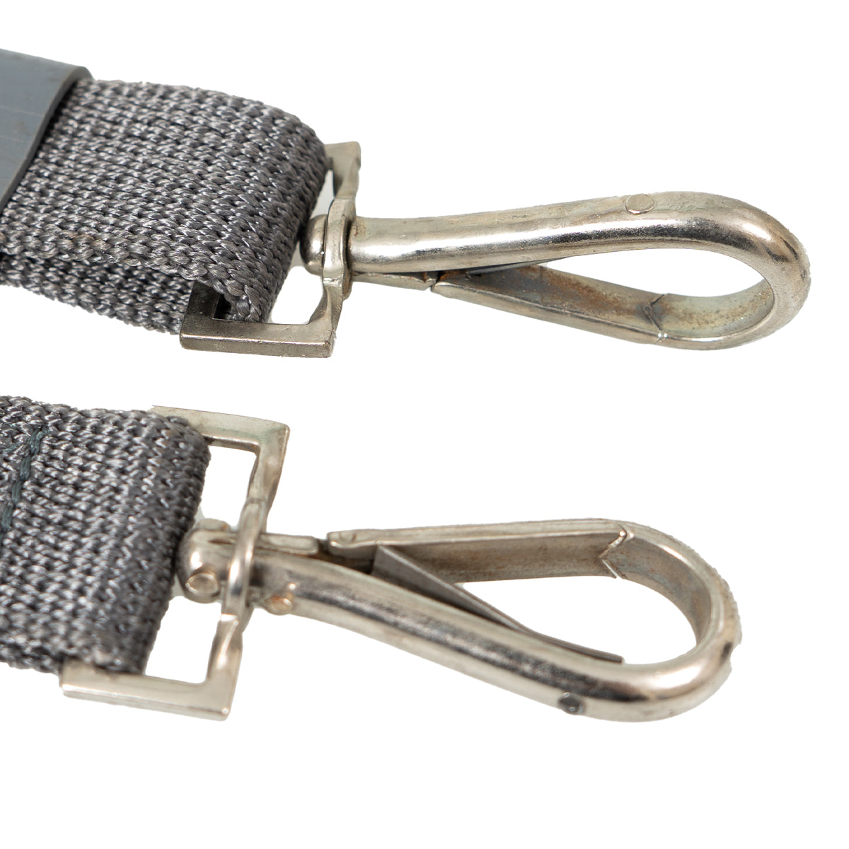 Detailed view of the dual spring-loaded steel hooks on an NVA rifle sling, highlighting the attachment points for MPi-K and MPi-AK-74 rifles.