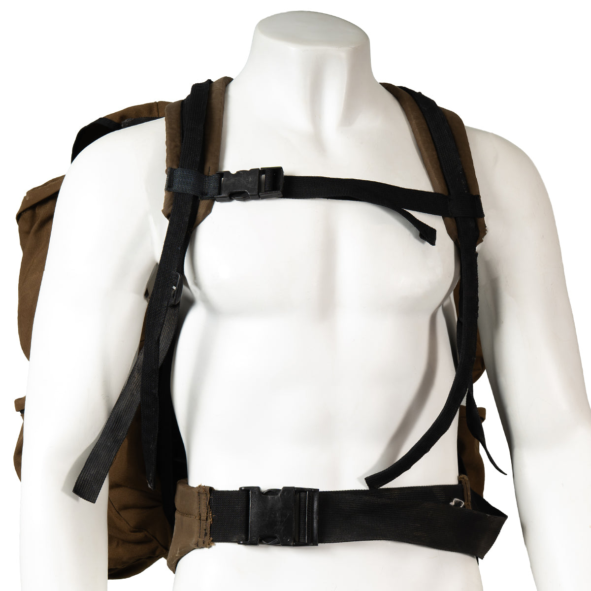 Front view of the Pattern 83 backpack on a mannequin, highlighting the adjustable chest strap and buckle system for secure fit during patrols.