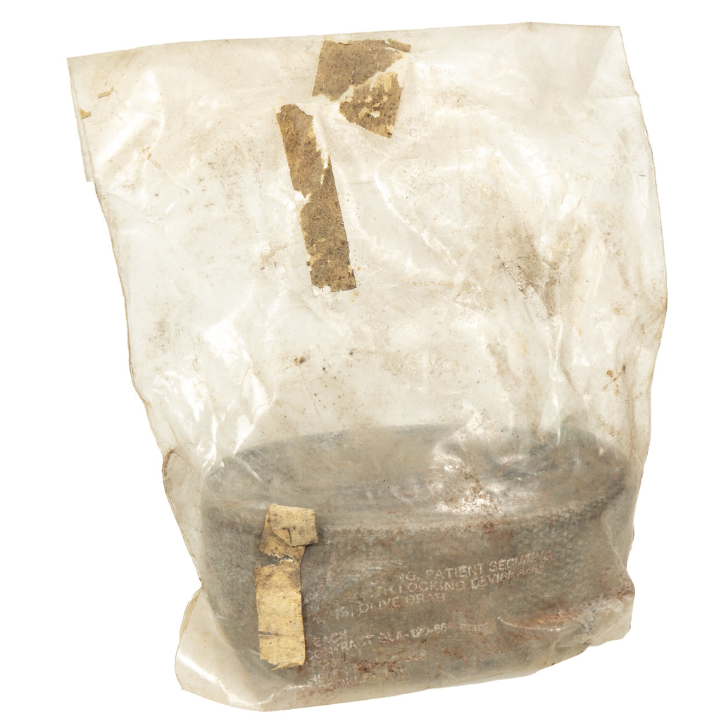 Utility strap in plastic bag