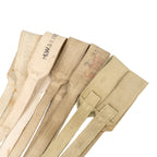 Group view showing diverse shades of 37 Pattern cross straps, from off-white to worn khaki.
