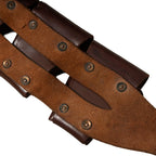 Reverse side of a WW2 South African leather bandolier showing internal construction, heavy-duty rivets, and rugged leather texture.